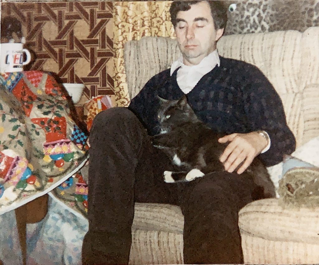 Dudley at Christmas at his brother Richard's house with Tommy the Cat
